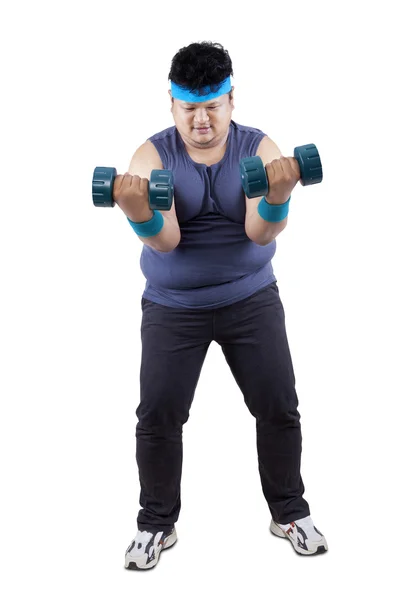 Full length of fat man exercising — Stock Photo, Image