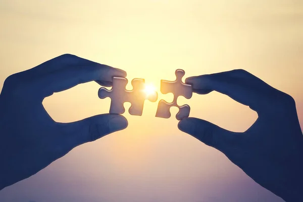 Close Unknown Man Hands Connecting Jigsaw Pieces Dawn Sky Background — Stock Photo, Image