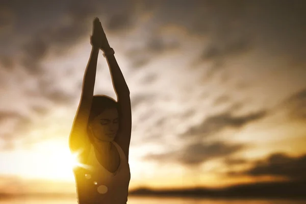 Close Young Woman Doing Yoga Exercise Seashore While Sitting Sunset — Stock Photo, Image