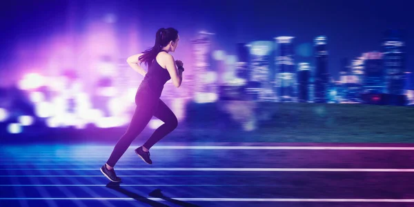 Rear View Young Woman Running Fast Track Blurred Glowing City — Stock Photo, Image