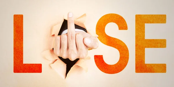 Closeup Unknown Hand Breaking Paper Wall While Showing Middle Finger — Stock Photo, Image