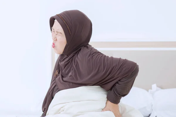 Elderly Muslim Woman Suffering Backache While Wake Morning Bedroom Home — Stock Photo, Image