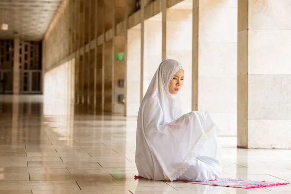 Devout Woman Praying Allah Doing Salat While Sitting Mosque — стоковое фото