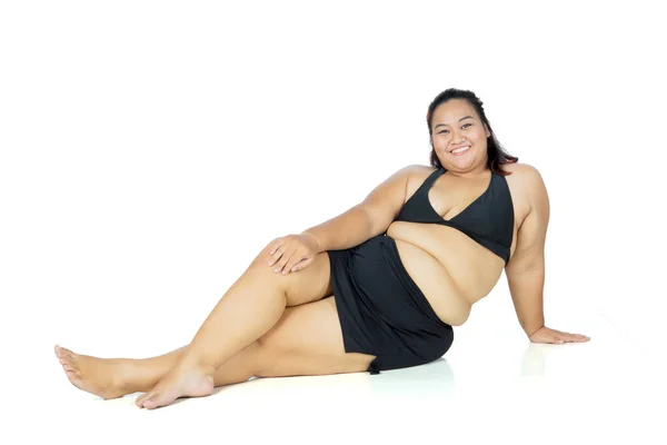 Young Fat Woman Smiling Camera While Wearing Swimsuit Sitting Studio — Stock Photo, Image