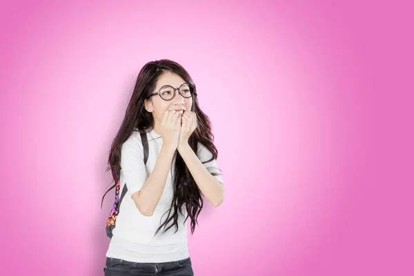 Female College Student Biting Her Fingers Afraid Expression While Standing — Stock Photo, Image