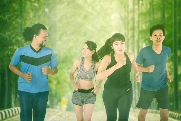 Group Diversity People Wearing Sportswear While Jogging Together Park — Stock fotografie