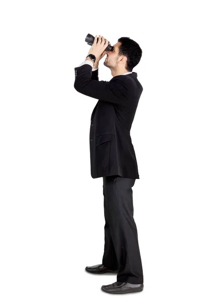 Full Length Male Manager Using Binoculars While Standing Studio Isolated — ストック写真