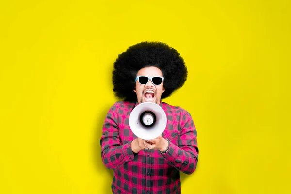 Excited Male College Student Shouting Megaphone While Standing Studio Yellow —  Fotos de Stock