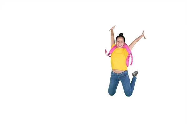 Happy Female Student Carrying Backpack While Jumping Copy Space Studio — Foto Stock