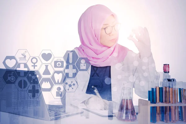 Double Exposure Muslim Female Scientist Checking Test Tube Writing Clipboard — Stok fotoğraf