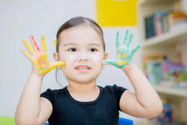 Adorable Little Girl Showing Painted Hands While Playing Studying Kindergarten — Stockfoto