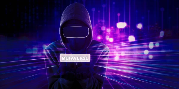 Double Exposure Hooded Hacker Using Goggles While Showing Metaverse Word — Fotografia de Stock