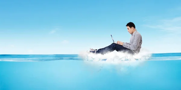 Young Man Working Laptop Cloud While Floating Sea Blue Sky — Stock fotografie