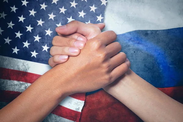 Two Hands People Handshaking Reconciliation Russia America Flag Background — Stock Photo, Image