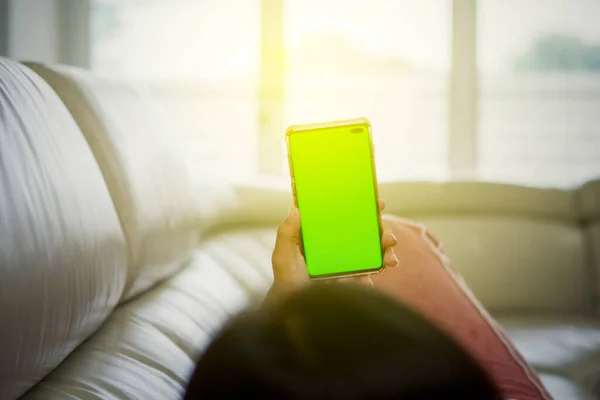 Back View Young Woman Using Cellphone Blank Green Screen While — Stock fotografie