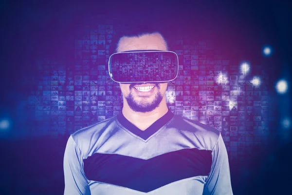 Happy Young Man Wearing Goggles While Standing Cyberspace Virtual Screen —  Fotos de Stock