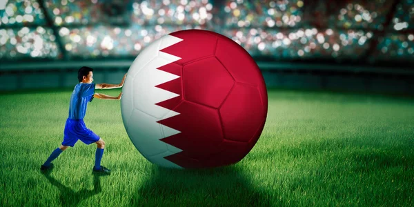 Visão Traseira Jogador Masculino Empurrando Uma Bola Com Bandeira Qatar — Fotografia de Stock