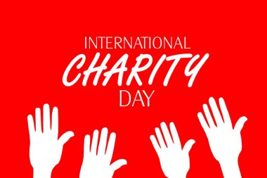 Close up of international Charity day text with hands symbol in red background