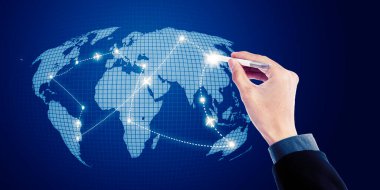 Close up of hand using a stylus pen while touching airplanes route on world map with virtual screen background