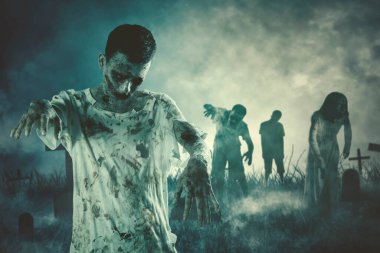 Horror halloween concept. Group of spooky ghosts walking in the misty graveyard after rising out of the ground