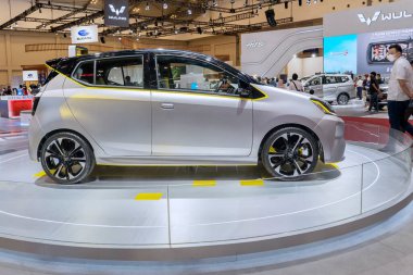 Tangerang - Indonesia. August 18, 2022: Side view of new Daihatsu Ayla Ev showcased in an event of Gaikindo Indonesia International Auto Show 2022