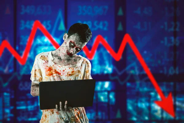 Creepy male zombie using a laptop while standing with declining finance arrow background