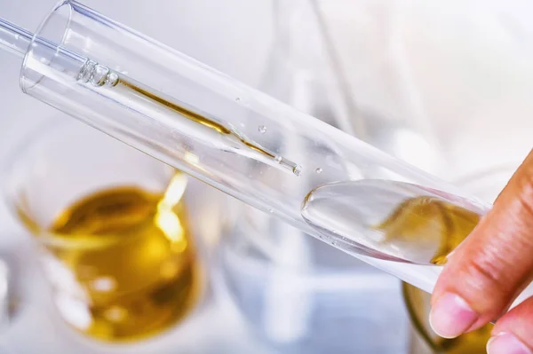 Oil dropping, Chemical reagent mixing, Laboratory and science experiments, Formulating the chemical for medical research, Quality control of petroleum industry products concept