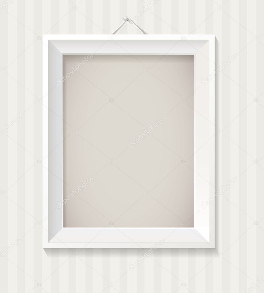 White empty frame hanging on the wall