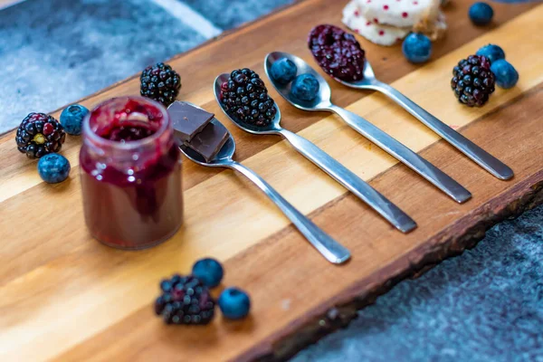 Blueberry Blackberry Chocolate Placed Silver Spoon Wooden Desk Ingredients Marmalade — Stock Photo, Image