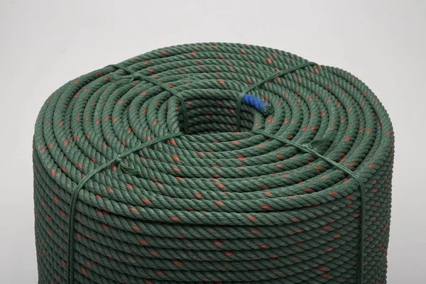 Large Roll New Green Rope Shipping Industry Stock Photo