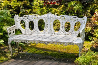 White chair for relaxing in the garden