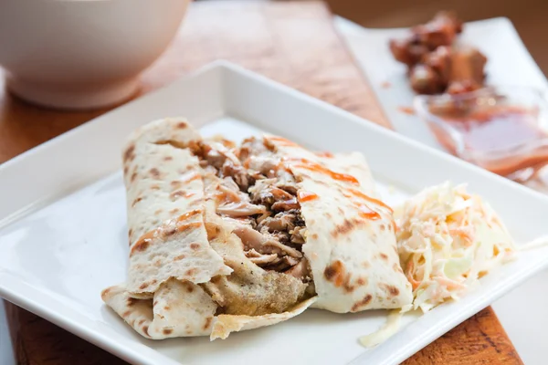 Pollo cretino in stile caraibico Roti Foto Stock