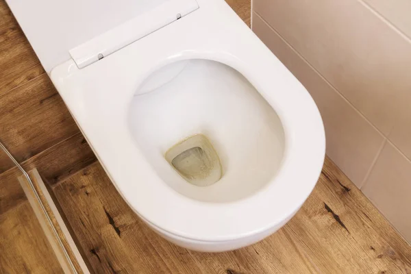 Dirty unhygienic toilet bowl with a lime stain in the toilet close-up — Stock Photo, Image