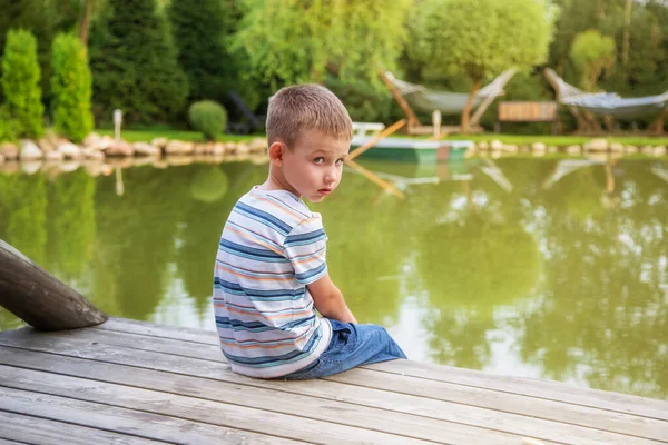 Little European Boy Striped Shirt Sitting His Back Child Sad — Stock Photo, Image