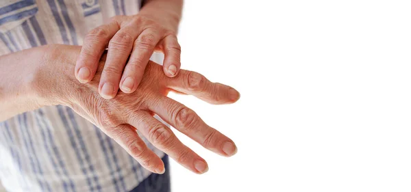 Close White Background Copy Space Elderly Woman Applies Moisturizing Cream Royalty Free Stock Photos