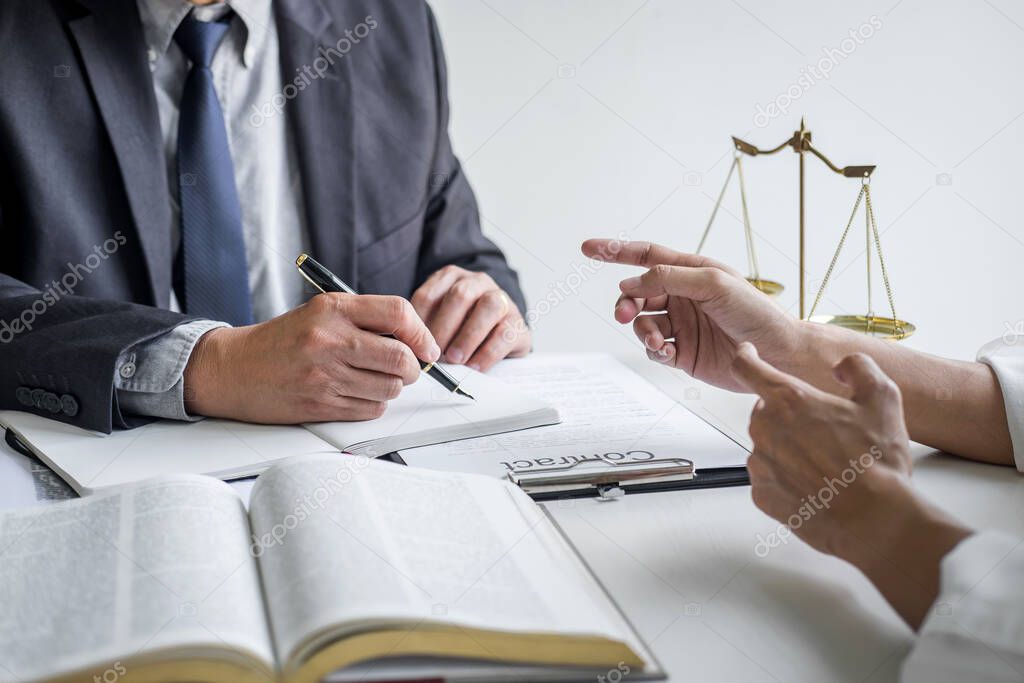 Good service cooperation, Consultation of Businesswoman and Male lawyer or judge counselor having team meeting with client, Law and Legal services concept.