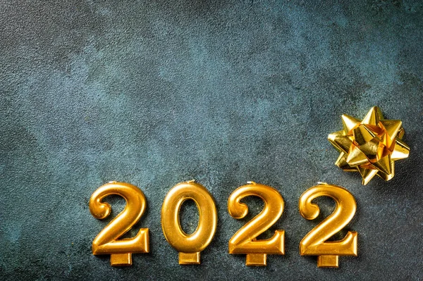 2022 numbers with champagne bottle and decor. Happy new year and festive concept. Top horizontal view copyspace. New Year Flatly. Christmas flatlay. New year 2022. New year concept. — Stock Photo, Image