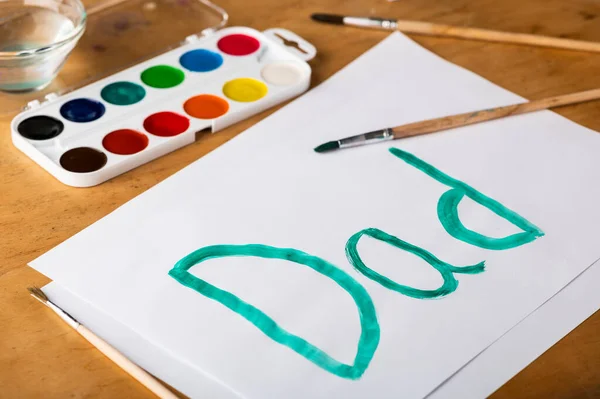 Painted Word Dad Watercolors White Paper Father Day Family Concept — Stock Photo, Image