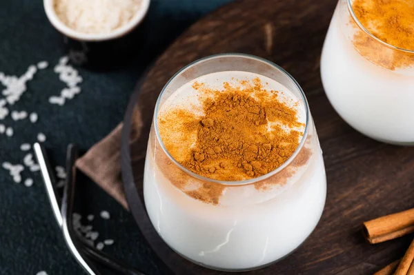 Delicious Horchata with cinnamon in the top. Rice water. Valencian Horchata made with rice, milk and cinnamon topping. Mexican drink. Vegetarian cocktail. Rice milk