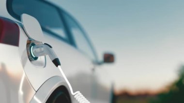 Elektrikli araba şarj oluyor. Elektrikli araç, arabanın fişini takıyor. 4K Sinematik 3D görüntüleme