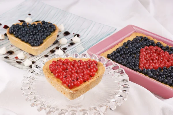 Assorted berry tarts — Stock Photo, Image