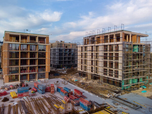 Busy Construction Site and Construction Equipment Aerial top view