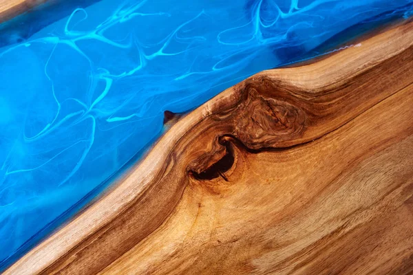 Texture of a wooden table with epoxy resin. nobody.