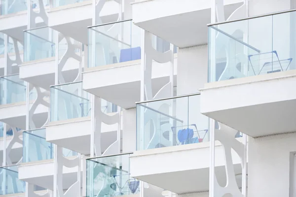 White building hotel with many terraces at the sea resort