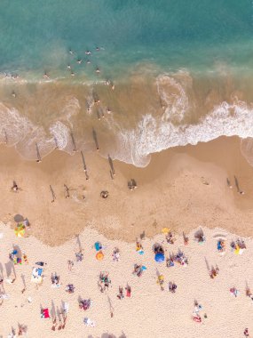 Aerial top View From Flying Drone Of People Crowd Relaxing On Beach In Bulgaria