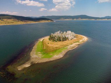 Aerial top view of Island on a Batak Reservoir located in Bulgaria, Rhodopa Mountains