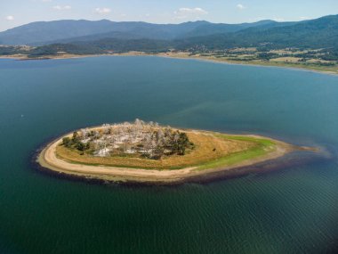 Aerial top view of Island on a Batak Reservoir located in Bulgaria, Rhodopa Mountains