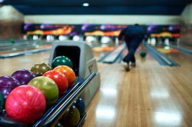Brightly colored bowling balls closeup