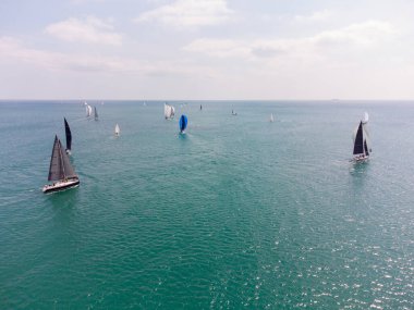Aerial top view of sailing yachts regatta race on sea near Varna in Bulgaria, Black sea