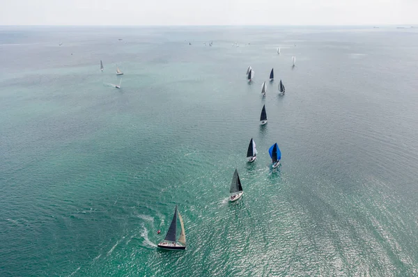 Aerial top view of sailing yachts regatta race on sea near Varna in Bulgaria, Black sea